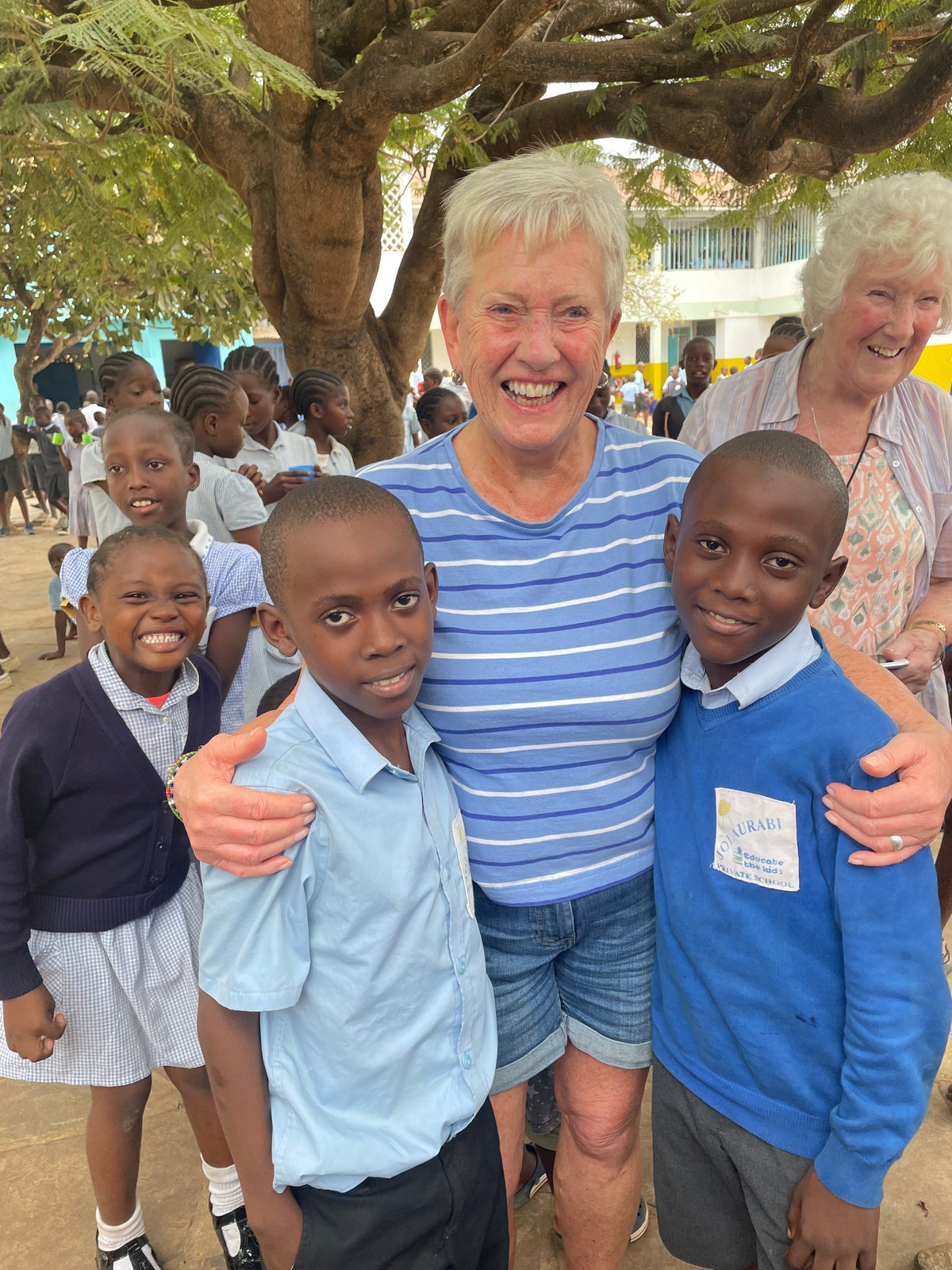 My Mum with 2 children she sponsors at Jolaurabi School in Kenya.