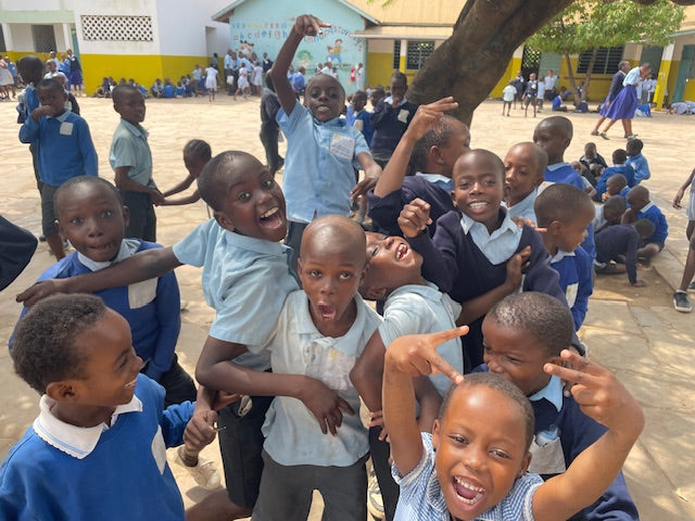 Children at Jolaurabi School, run by Educate the Kids,  playing in the playground