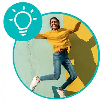 Person in yellow sweater and jeans jumping on a colorful background with a light bulb icon.