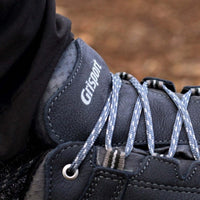 Close-up of a pair of Grisport hiking boots with blue laces.